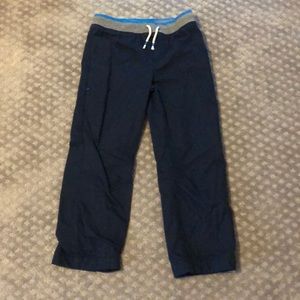 A pair of navy blue joggers.